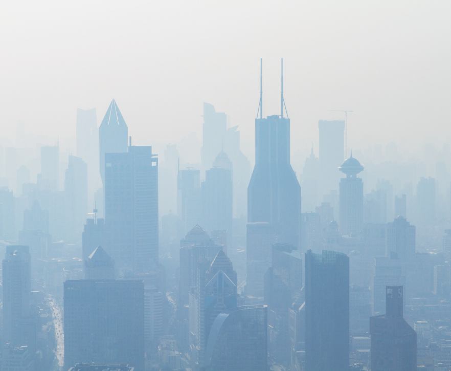 Skyline view of city with visibility obstructed by smog or fog or smoke